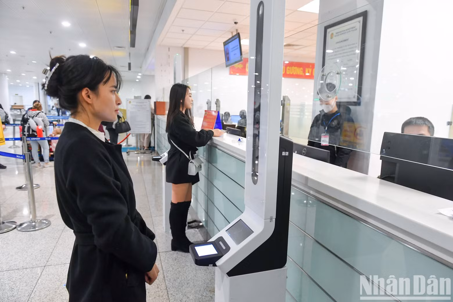 Passengers check in at the manual column.
