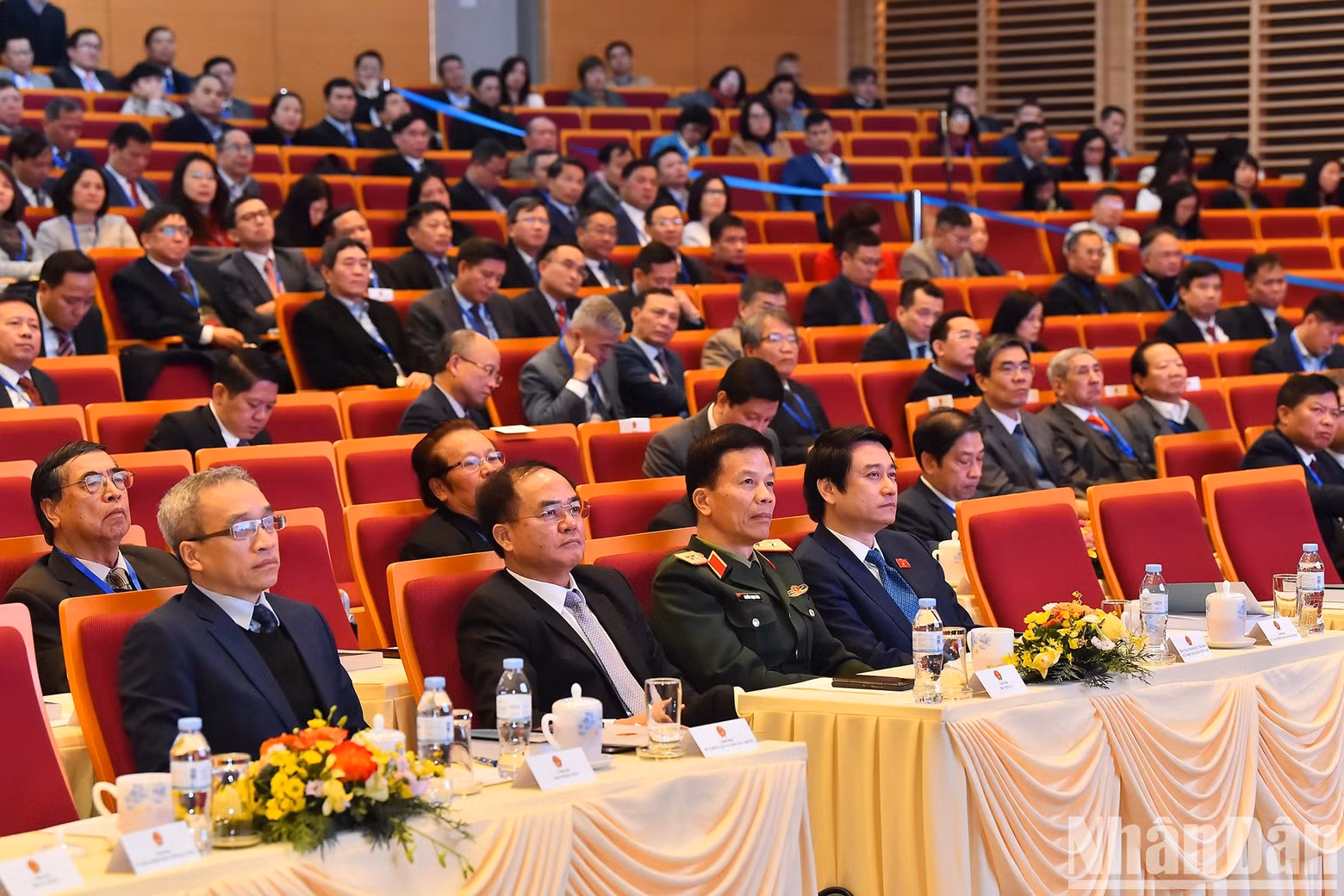 Delegates attend the plenary session on building and developing the diplomatic sector.