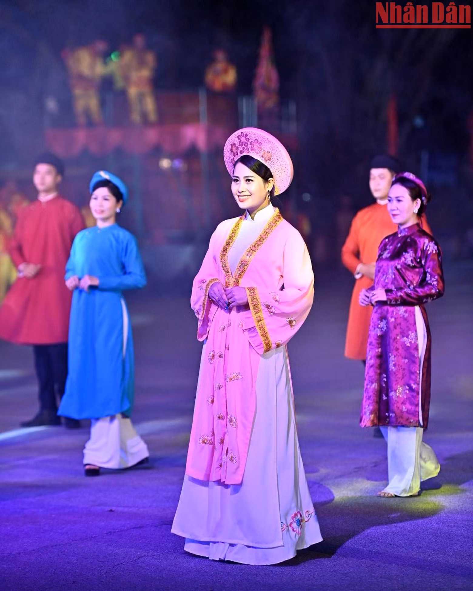 The show of Ao Dai (traditional long dress) by artists from Hue ancient city The show of Ao Dai (traditional long dress) by artists from Hue ancient city