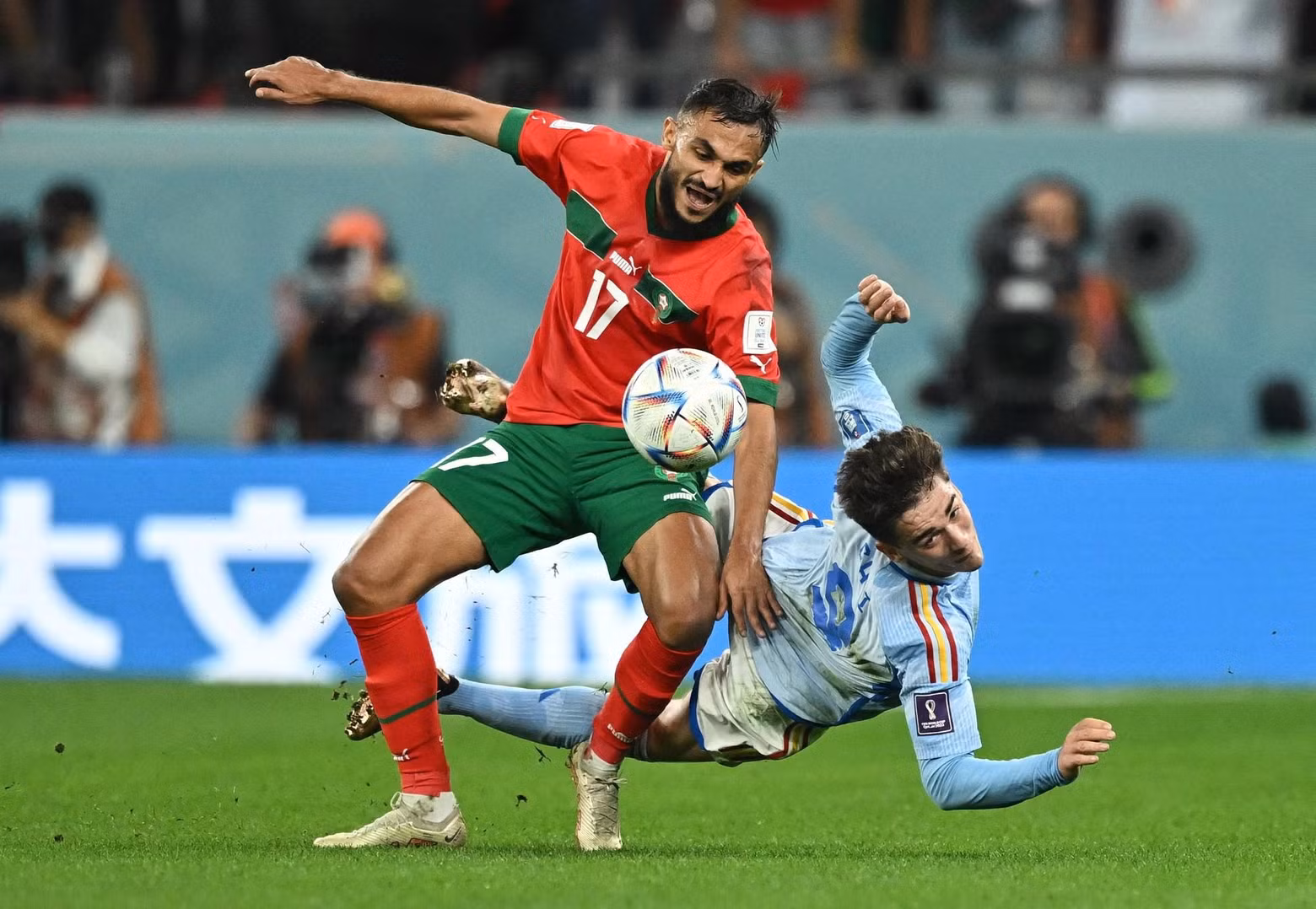 Morocco's Sofiane Boufal in action with Spain's Gavi. (Photo: REUTERS)