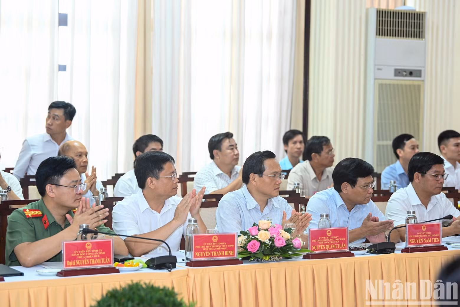 Delegates attend the session.