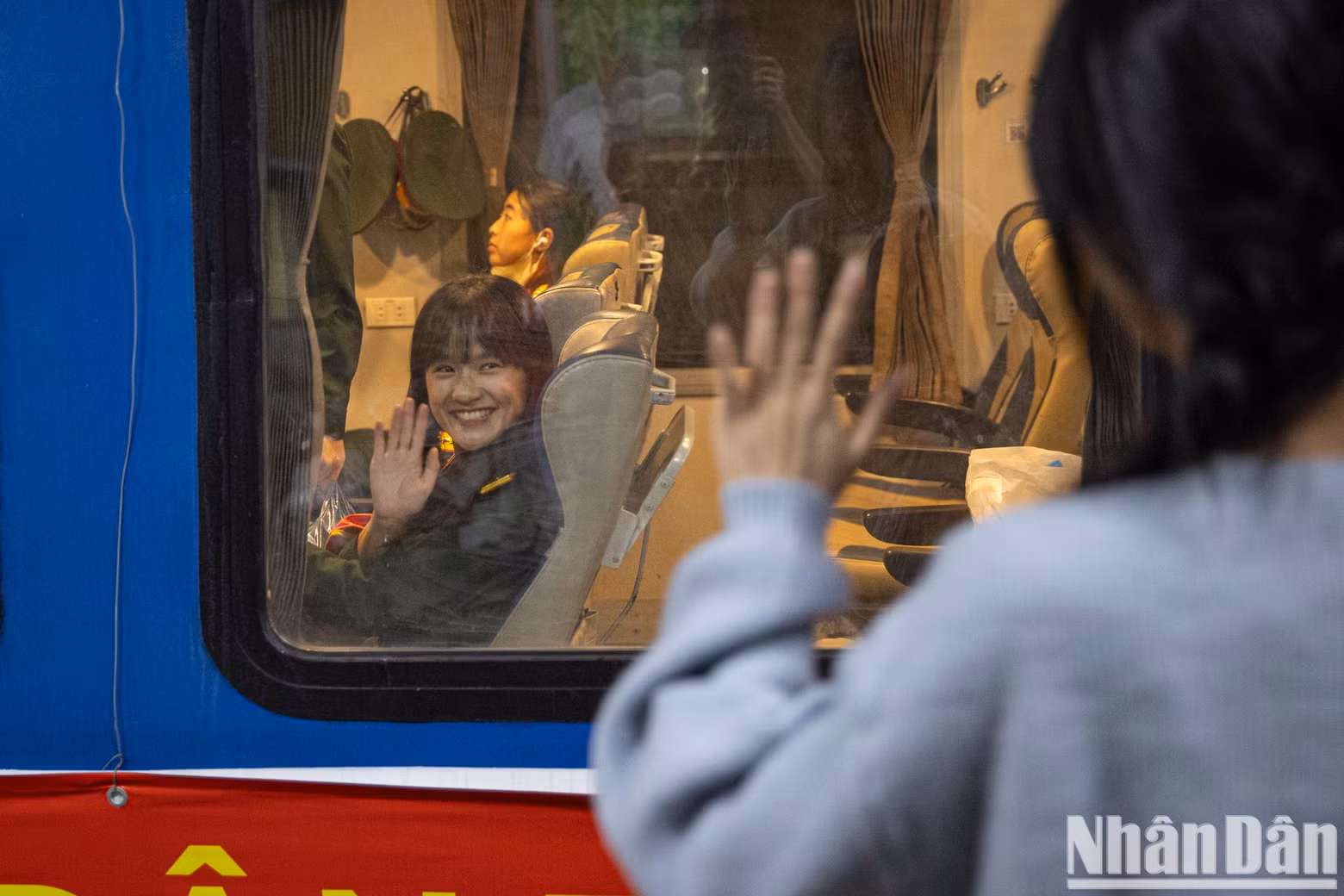 Relatives said goodbye to the soldiers through the train window.