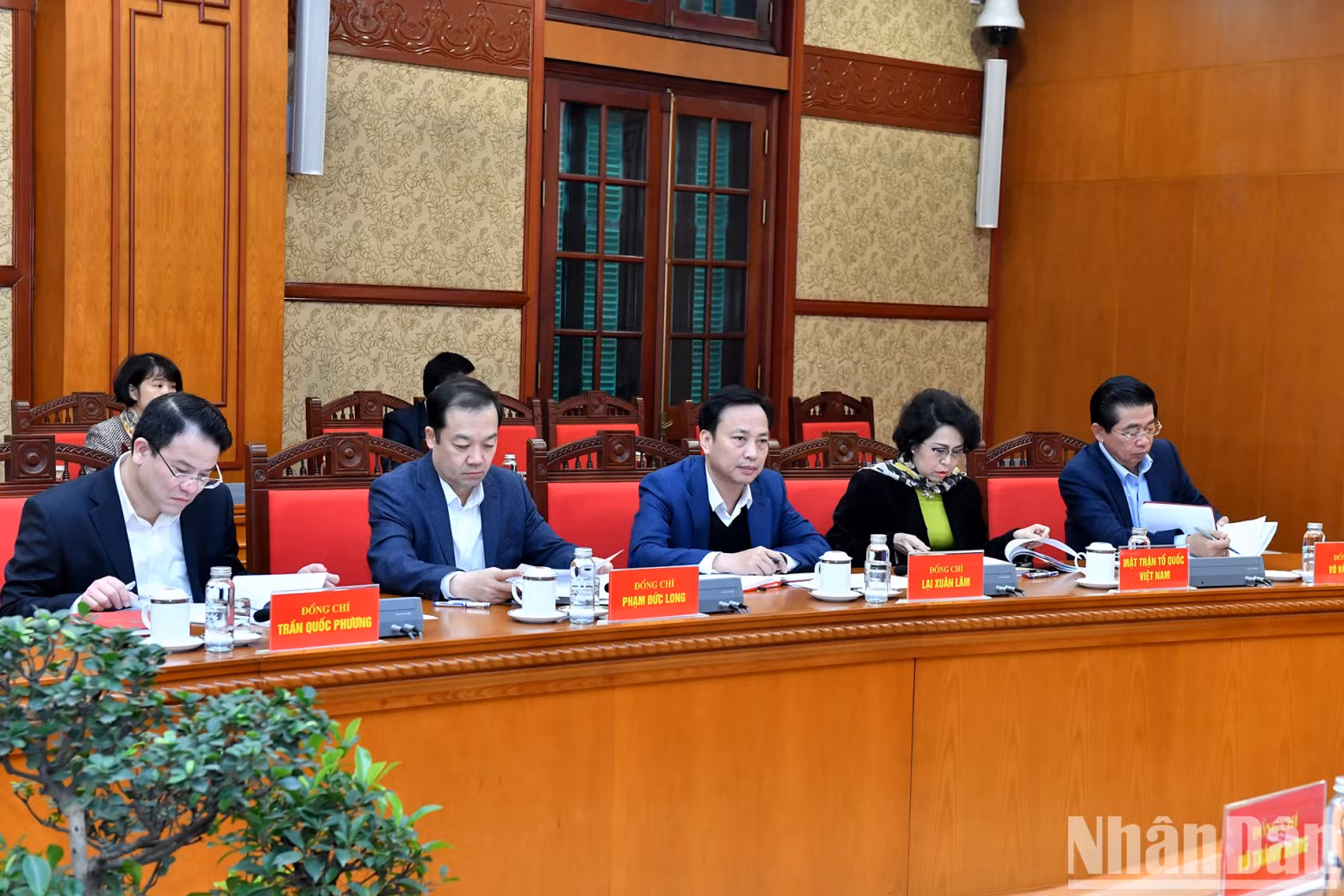 Delegates attend the meeting.