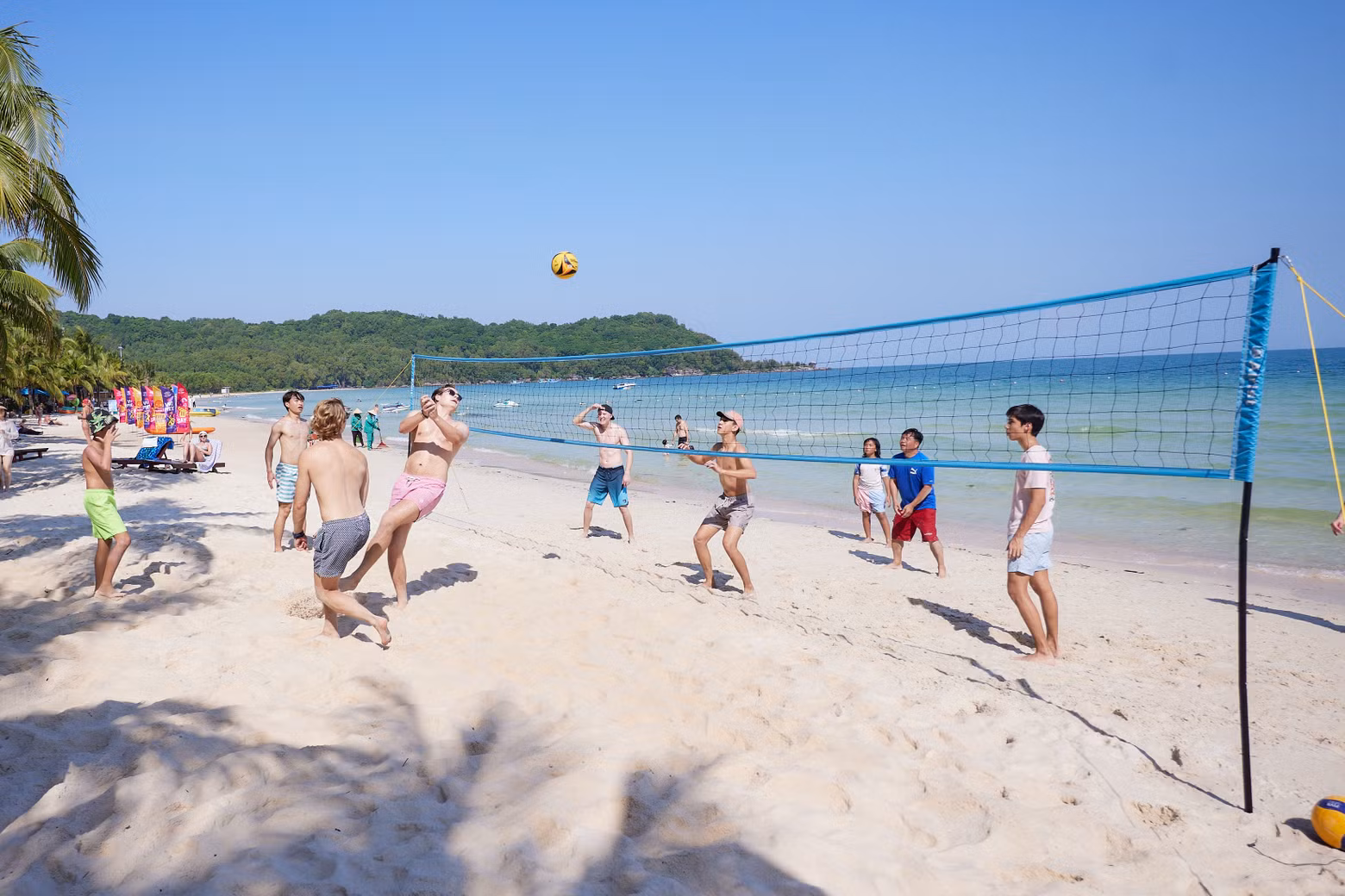 International tourists playing volleyball at Bai Kem – one of the world’s most beautiful beaches in Phu Quoc. International tourists playing volleyball at Bai Kem – one of the world’s most beautiful beaches in Phu Quoc.