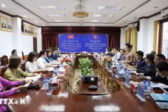 The talks between officials of Viet Nam's Dien Bien province and Bokeo province of Laos on September 16 (Photo: VNA)