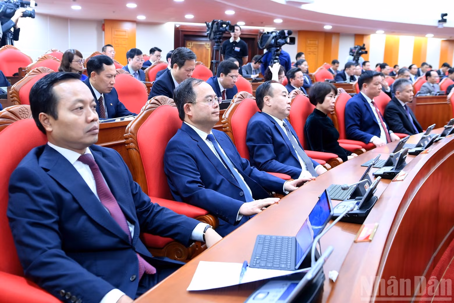 Delegates attend the opening session of the conference.