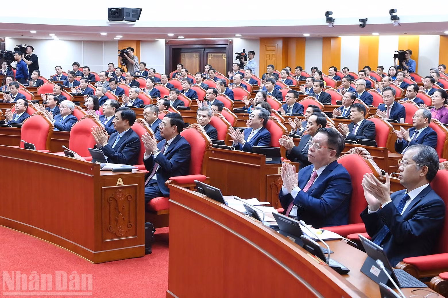 Delegates attend the opening of the fourth plenum of the 14th Party Central Committee.