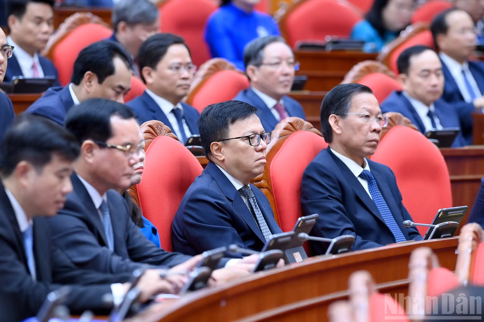 Delegates attend the opening session of the conference.