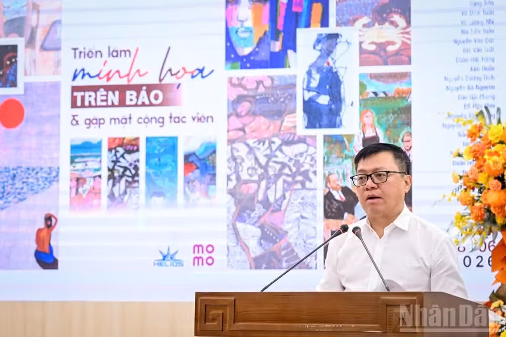 Nhan Dan Editor-in-Chief Le Quoc Minh speaks at the opening ceremony.
