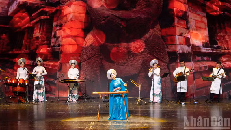 A traditional musical instrument performance at the art programme “Colours of Culture”.