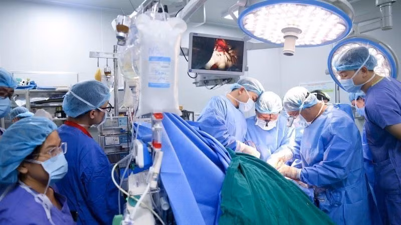 Doctors at Viet Duc University Hospital perform an organ transplant.
