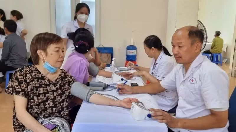 Doctors from Phong Tho General Hospital provide free health examinations for residents on June 2.