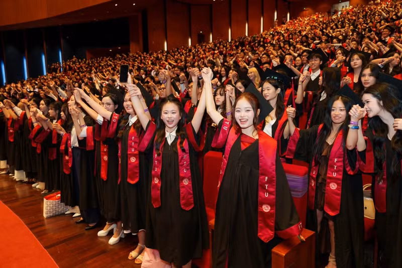 University students at a graduation ceremony. Photo: FTU