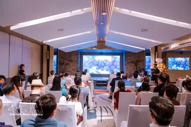 Participants attend a seminar on the development and promotion of the Son La Arabica coffee brand in Ha Noi on June 19. (Photo: VNA)