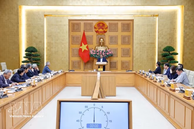 At the meeting between Prime Minister Pham Minh Chinh with the Policy Adviory Council in Ha Noi on March 7, 2026. Photo: VNA