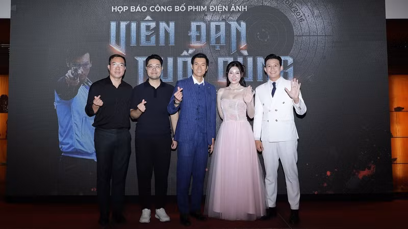 Olympic champion Hoang Xuan Vinh (far right) pictured with the film’s cast and crew at the unveiling ceremony