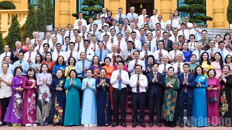 State President Luong Cuong and delegates at the event