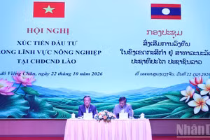 Vietnamese Ambassador to Laos Nguyen Minh Tam (L) and Lao Deputy Minister of Agriculture and Environment Xaynakhon Inthavong co-chair the conference. (Photo: nhandan.vn)