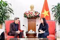 Deputy Minister of Foreign Affairs Le Thi Thu Hang receives Rolf Mutzenich, a member of the Foreign Affairs Committee of the German Bundestag, in Ha Noi on August 18. (Photo: baoquocte.vn)