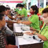 Around 2,000 people of Vietnamese origin and disadvantaged Cambodian residents receive free medical examinations, medicines, and gifts. (Photo: HUY VU)