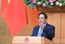 Prime Minister Pham Minh Chinh speaks at meeting. (Photo: Tran Hai)