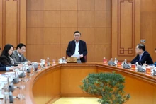 Politburo member and Standing Member of the Party Central Committee’s Secretariat Tran Cam Tu chairs a working session with the Party Central Committee Office and relevant agencies to review preparations for the 14th National Party Congress. (Photo: Dang Khoa)