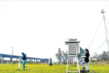 Staff collecting data at the Sa Pa Hydrometeorological Station, Lao Cai Province.