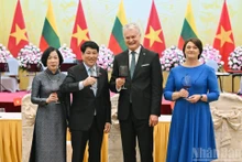 President Luong Cuong and his spouse host a State banquet in Ha Noi on June 12 evening in honour of visiting Lithuanian President Gitanas Nauseda and his spouse. (Photo: Thuy Nguyen)