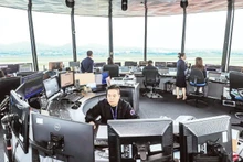 Air traffic controllers on duty at the Noi Bai Air Traffic Control Tower (Ha Noi).
