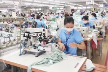 Garment production for export at Hoa Tho Garment Factory, Quang Ngai. (Photo: Hoang Anh)