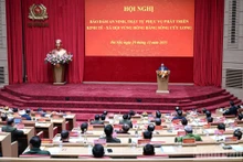 Prime Minister Pham Minh Chinh chairs the conference in Ha Noi on December 29. (Photo: Tran Hai)