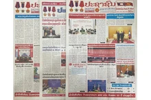 Front pages of major Lao newspapers in recent days have prominently featured articles praising Laos-Viet Nam relations. (Photo: Duy Toan)