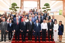 PM Pham Minh Chinh and the USABC delegation. (Photo: Tran Hai)