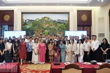 Delegates at the conference pose for a photo.