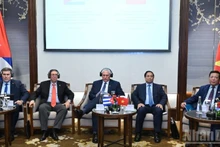 Vietnamese and Cuban leaders at the event. (Photo: NDO)