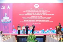 The meeting with international friends held in Ha Noi on September 2 (Photo: NDO)