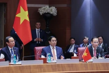 Prime Minister Pham Minh Chinh during the talks with his Algerian counterpart Sifi Ghrieb. (Photo: VGP)