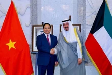 Prime Minister Pham Minh Chinh and Kuwaiti Prime Minister Sheikh Ahmad Abdullah Al-Ahmad Al-Sabah. (Photo: VGP)