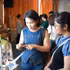 Delegates visit green products displayed at the seminar.