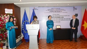 Scene of the ceremony awarding the French Order of Arts and Letters (Officer) to Dr Ngo Phuong Lan.