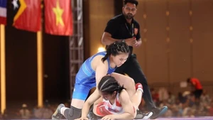 In a wrestling event (Photo: VNA)