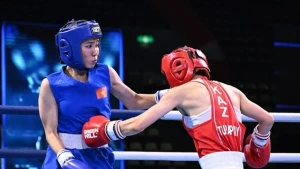 Nguyen Thi Ngoc Tran of Viet Nam (left) defeats Kazakhstan’s tough Gulnar Turapbay in the ASBC Asian U22 & Youth Boxing Championships' women's U22 50kg class in Colombo, Sri Lanka, on May 23. ̣ (Photo of ASBC)
