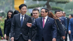 Prime Minister Pham Minh Chinh and Singaporean Prime Minister Lawrence Wong. (Photo: NDO/Tran Hai)