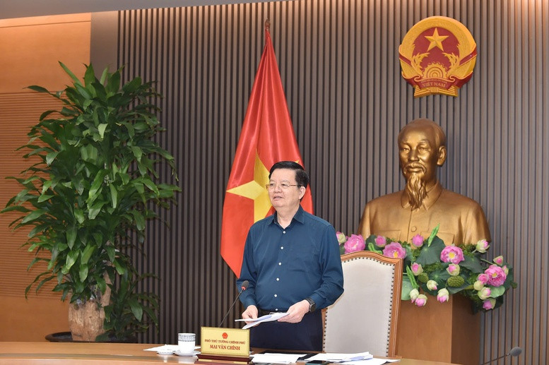 Deputy Prime Minister Mai Van Chinh speaks at the meeting. (Photo: VGP)