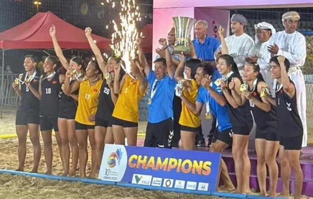 Viet Nam team celebrate their Asian Women's Beach Handball Championship title on May 15 in Mucat, Oman. (Photo of VHF)