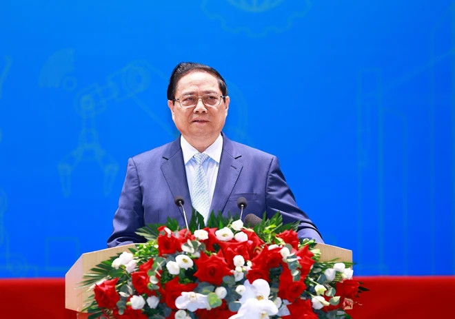 PM Pham minh Chinh speaks at the national forum on labour productivity held by the Vietnam General Confederation of Labour. (Photo: VNA)