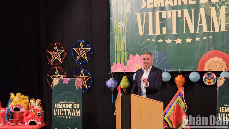 CEO of Système U Noisiel Supermarket Benoit Monfort speaks at the event.