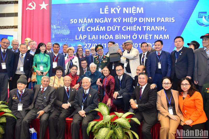 Delegates pose for a group photo at the ceremony.