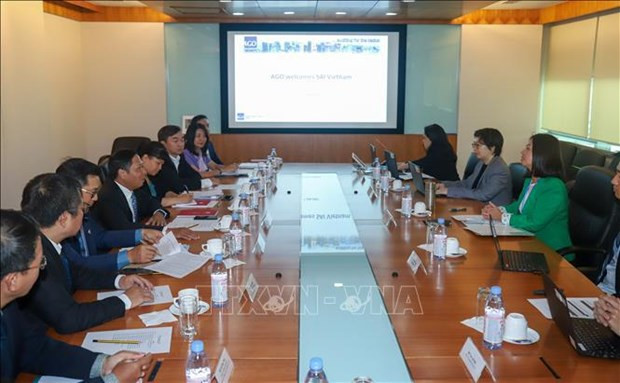 A delegation from the State Audit Office of Vietnam held a working session with Auditor-General's Office of Singapore on July 7 (Photo: VNA) 