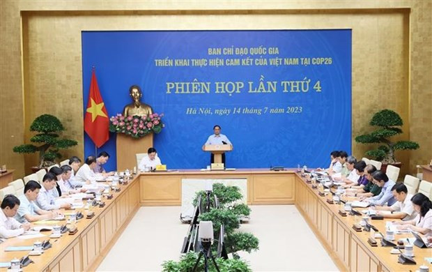 Prime Minister Pham Minh Chinh speaks at the meeting. (Photo: VNA)